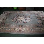Chinese rug, with a pale blue field and flower design, 184cm wide, 283cm long