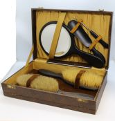 Ebony dressing table set, housed in a silk lined travelling case