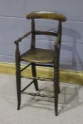 19th Century child's high armchair, with a curved bar back and seat above tall legs