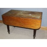 George III mahogany drop leaf extending dining table, in the manner of Gillows, with a drop leaf