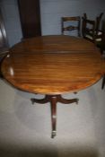 Regency style mahogany twin pillar D end dining table, with one extra leaf, together with a