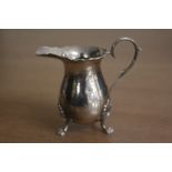 Elizabeth II silver cream jug, Birmingham 1969, maker Joseph Gloster Ltd, with scrolled handle and
