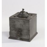 19th Century pewter inkwell, of square form, with hinged circular lid above two drawers, 8cm wide