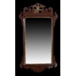 19th Century mahogany and gilt gesso wall mirror, the rectangular mirror plate within the gilt