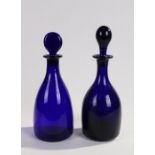 Two 19th Century blue glass decanters, the tallest 29.5cm high (2)