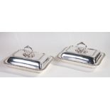 Pair of silver plated entree dishes and covers, by Mappin & Webb, each with lift up lids and