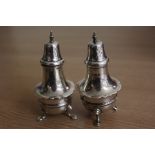 Pair of Edward VII silver pepperettes, Birmingham 1903, maker John Rose, the pierced tapering