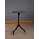 19th Century mahogany wine table, the circular top above a turned column and tripod base, 41.5cm