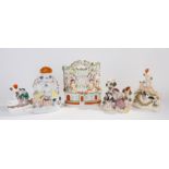 Five various Victorian Staffordshire figure groups, to include a cow and horse watering, a hunting