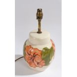 Moorcroft pottery table lamp, of ginger jar form, the cream ground with tube line and painted with
