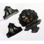 Three late Victorian papier mache wall brackets, each decorated with birds and butterflies amongst