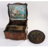 Late Victorian Polyphon music box, the shaped walnut box with brass inlaid hinged lid, opening to