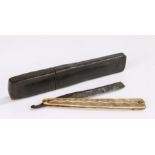 Early 19th Century cut throat razor, the leather clad case enclosing the bone etched handle and