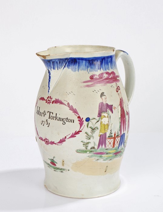 18th century porcelain jug, the body decorated with Oriental figures in a landscape, with