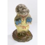 Victorian garden gnome, the composite gnome painted in yellow, red and blue holding two pots, 37cm