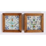 Two 18th Century Delft tiles, painted with a flower to the centre of each in blue, yellow and green,