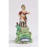 Early 19th Century Walton pearlware figure, of a lady standing with a jumping dog on a