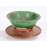 Chinese Liao green glazed bowl, Liao Dynasty (907 - 1125) with an arched lip above the tapered body,