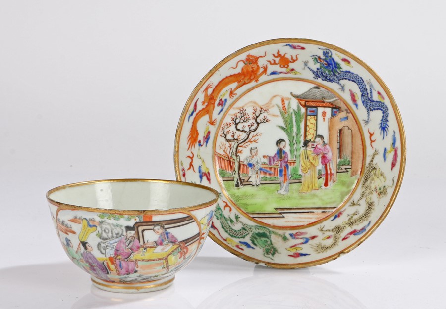 18th Century Chinese porcelain tea bowl and saucer, the gilt edge above the bowl decorated with a