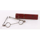 Pair of 19th Century spectacles, the unusually small lenses with a steel housed in the leather