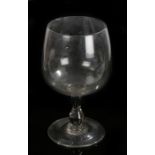 Very large and decorative wine glass, the bowl above the stem and wide foot with rough pontil