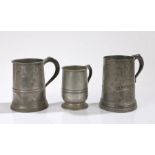 Three pewter tankards, to include a Victorian Quart mug stamped VR, another tankard stamped for