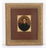 Mid 19th Century miniature portrait, of a gentleman in a black jacket, titled and dated in white