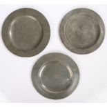 Three 18th/19th Century pewter plates, F MM to the underside of one with rubbed touch marks, the