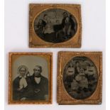 Three 19th Century ambrotypes, to include an elderly couple and two family groups, (3)