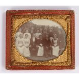 19th Century sixth plate ambrotype, of the staff of a household, butlers, maids, a game keeper