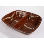 19th Century Staffordshire slipware baking dish, brown glaze with white slipware and divide to the