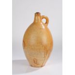 18th Century salt glaze pottery jug, with a short neck and handle to the large bulbous body, 45cm
