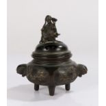 Japanese bronze censer, Edo period, the lid surmounted by a figure holding a bowl and staff above