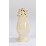 19th Century creamware castor, with a pierced dome top above the baluster body, 9cm high