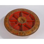 Victorian red painted circular staking board for the card game Pope Joan, the compartmentalized