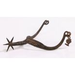 Medieval steel rowel spur, 13th-15th Century, with a freely moving star wheel and sweeping arms,