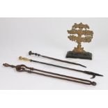 19th Century fireside tools, to include a poker, another with brass handle and a pair of tongs, also