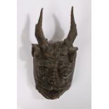 19th Century carved head, in the form of the Pagan God Pan, with antlers above the moustached and