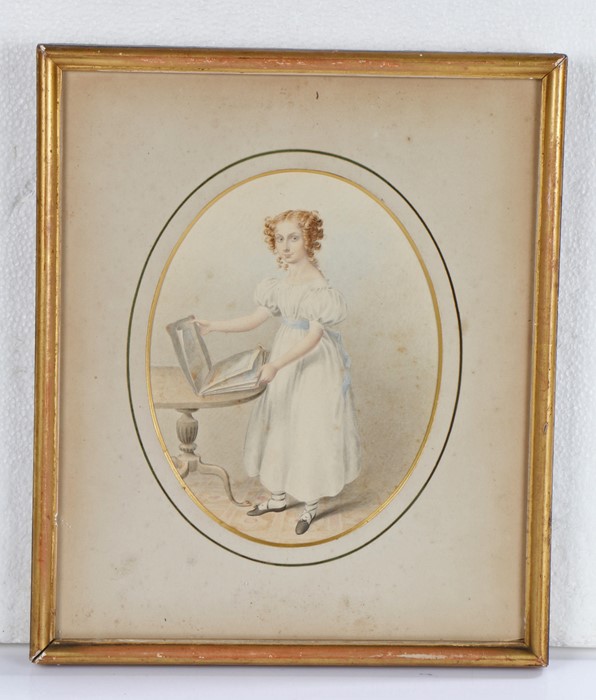 19th Century British school, a young lady standing by a book of landscapes, the rear of the