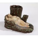 An unusual erotic 19th Century pottery match strike/spill vase, with a reclining lady pulling up her