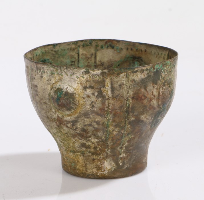 Sassanian small vessel, 6 Century AD, the silvered bowl with four bosses between a double line