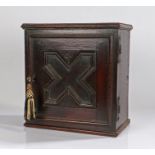 17th Century oak spice cabinet, the rectangular cabinet with a geometric panel cupboard door