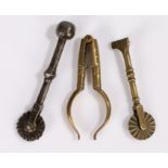 Pair of 18th Century brass nut crackers, together with two 19th Century crimpers, (3)