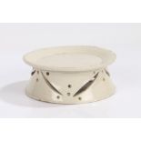 18th Century creamware pottery stand, the circular dish top above naivete lines and circular