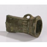 British Bronze age axe head, 1000 B.C. with a loop to base and four lines decorated to the rear of