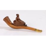 19th Century primitive carved erotic pipe, with a lady seated to the top of pipe with a long skirt