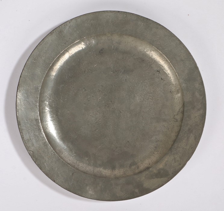 18th Century pewter charger, circa 1749, touch marks for Sam Ellis, with a board rim 42cm diameter