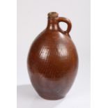 18th Century stoneware jug, of large proportions, the brown glaze jug with the number 4 and loop