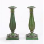 Unusual pair of 19th Century candlesticks, the base metal sticks painted in green with pewter