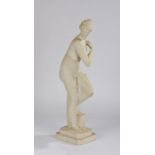 Cast marble statue of Venus, standing with a cloth draped to the side, the base signed Kosmolux